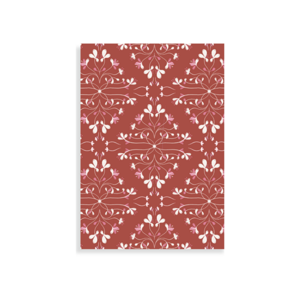 Pattern of pink and white flowers to a dark red background.